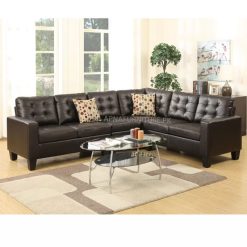 L shaped sofa in brown leatherette